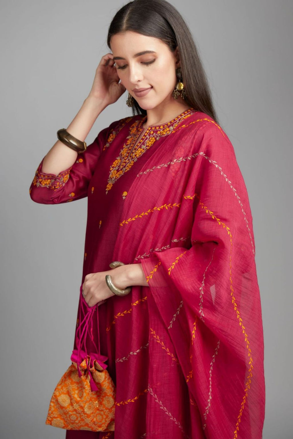 Deep wine straight kurta set, highlighted with all-over delicate contrast coloured embroidery