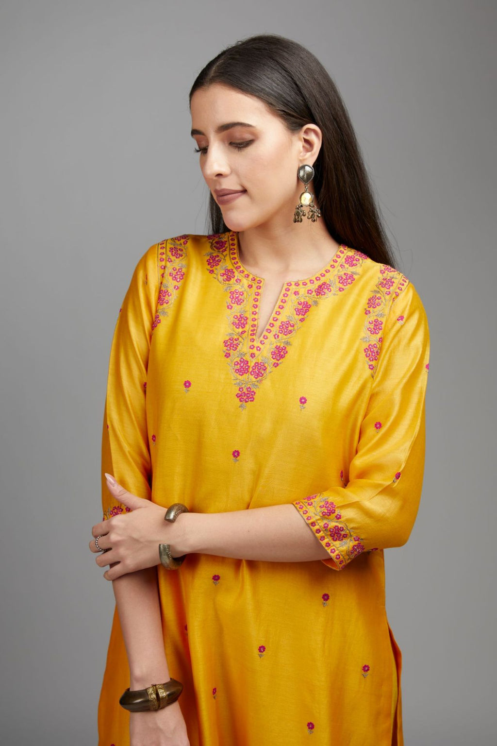 Mango yellow straight kurta set, highlighted with all-over delicate contrast coloured embroidery