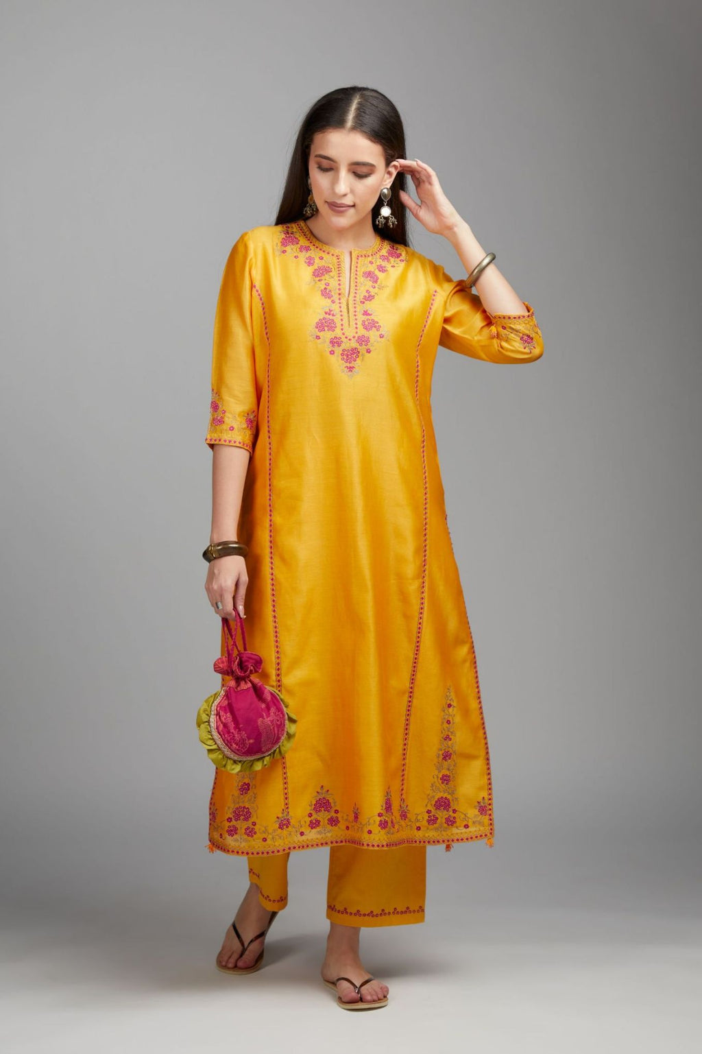 Mango yellow straight kurta set detailed with contrast coloured embroidery at neck and side panel joint seams