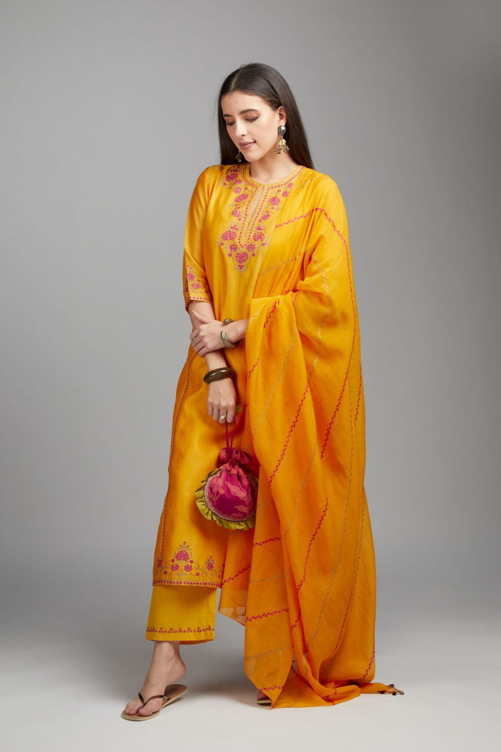 Mango yellow straight kurta set detailed with contrast coloured embroidery at neck and side panel joint seams