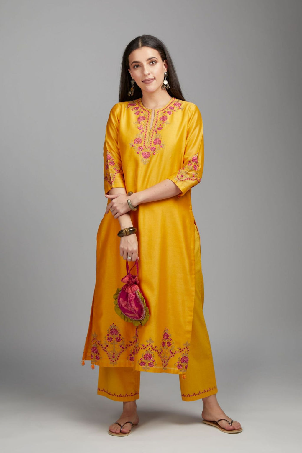 Mango yellow straight kurta set detailed with contrast coloured embroidery at neck and hem