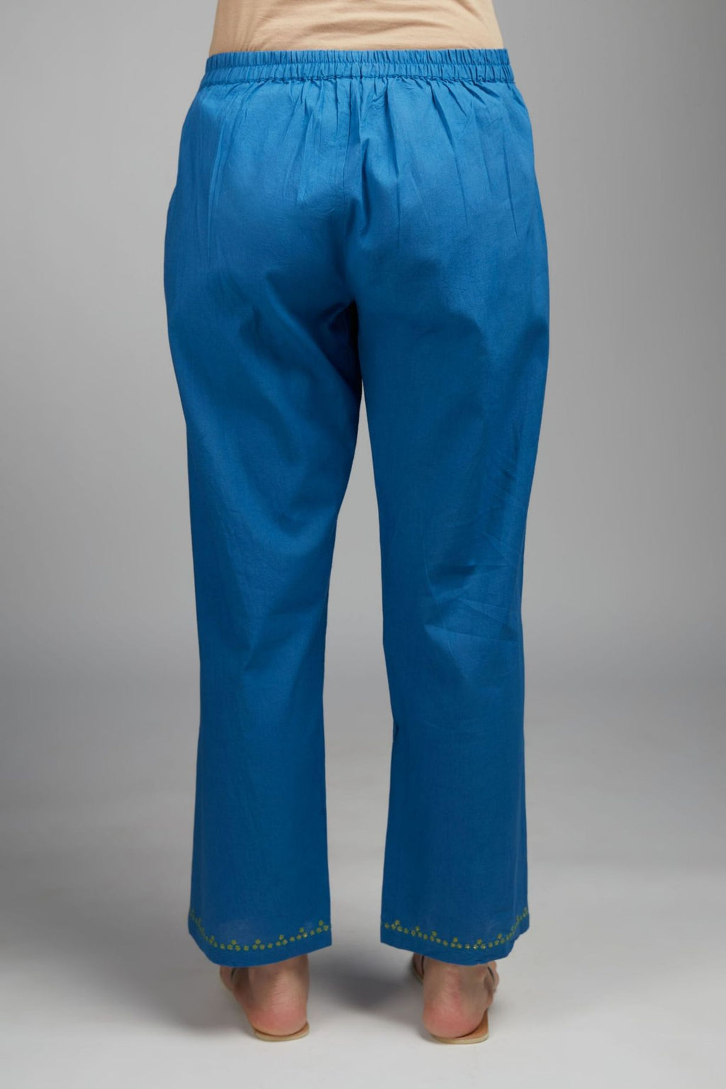 Blue cotton straight pant with embroidered hem