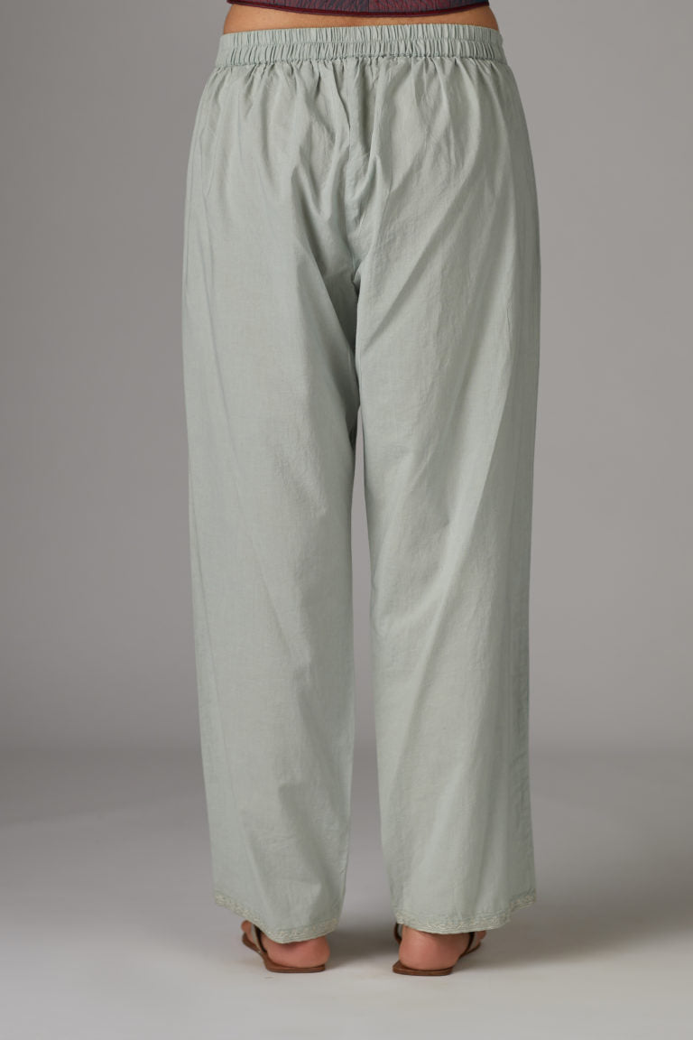 Grey cotton straight pants with aari embroidery at hem