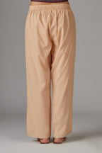 Peach cotton straight pants with aari embroidery at hem