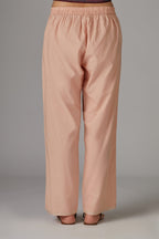 Pink cotton straight pants with aari embroidery at hem