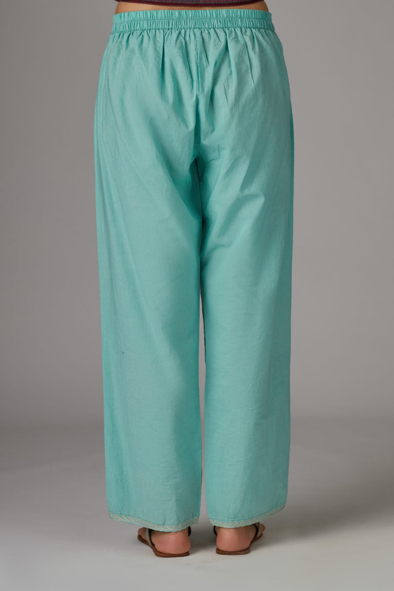 Teal cotton straight pants with aari embroidery at hem