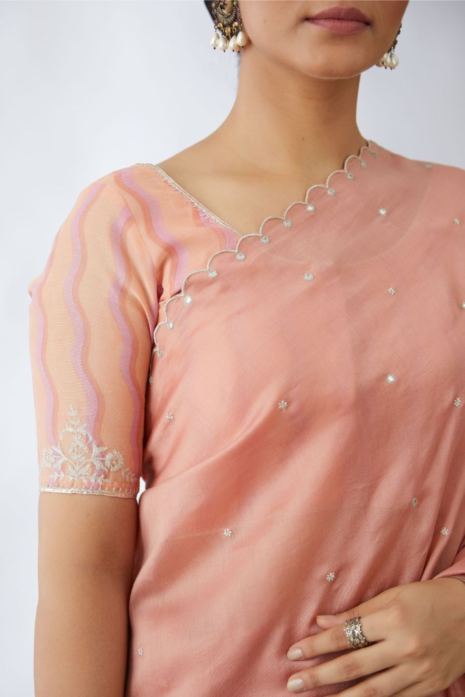 Peach and pink hand block printed blouse, highlighted with silver zari embroidery (Blouse)