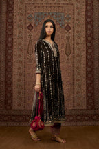 Grey silk velvet straight kurta set with all over heavy gold gota and zari embroidery.