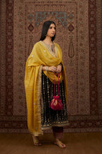 Grey silk velvet straight kurta set with all over heavy gold gota and zari embroidery.