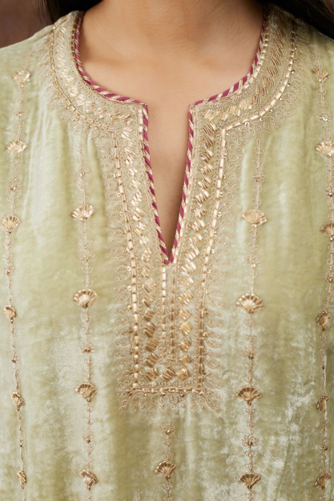 Soft green silk velvet straight kurta set with all over heavy gold gota and zari embroidery.