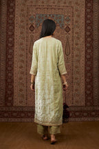 Soft green silk velvet straight kurta set with all over heavy gold gota and zari embroidery.
