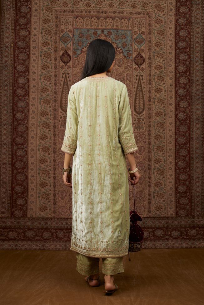 Soft green silk velvet straight kurta set with all over heavy gold gota and zari embroidery.