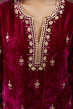 Silk velvet kurta set with round neck and all-over gota embroidery.