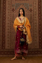 Silk velvet kurta set with round neck and all-over gota embroidery.