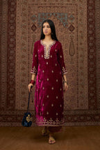 Silk velvet kurta set with round neck and all-over gota embroidery.