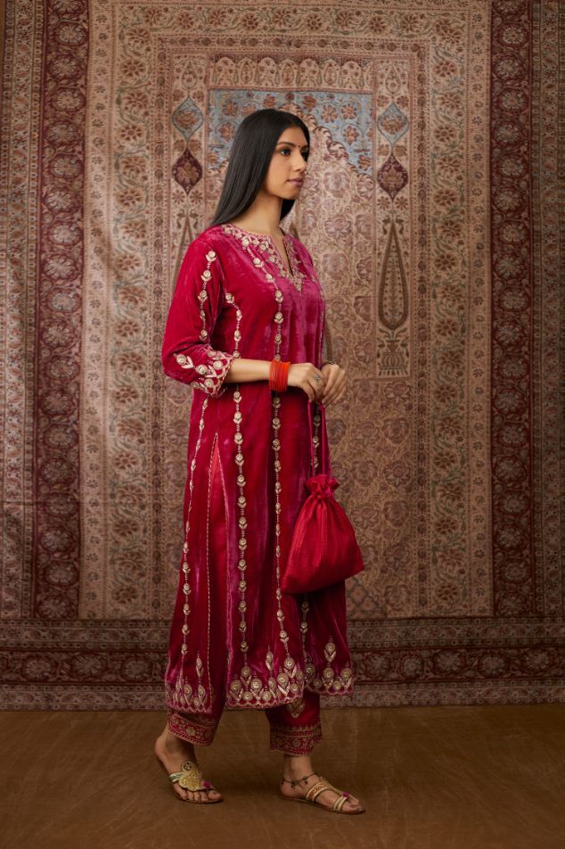 Fuchsia silk velvet straight kurta set with all over gold gota and zari embroidery.