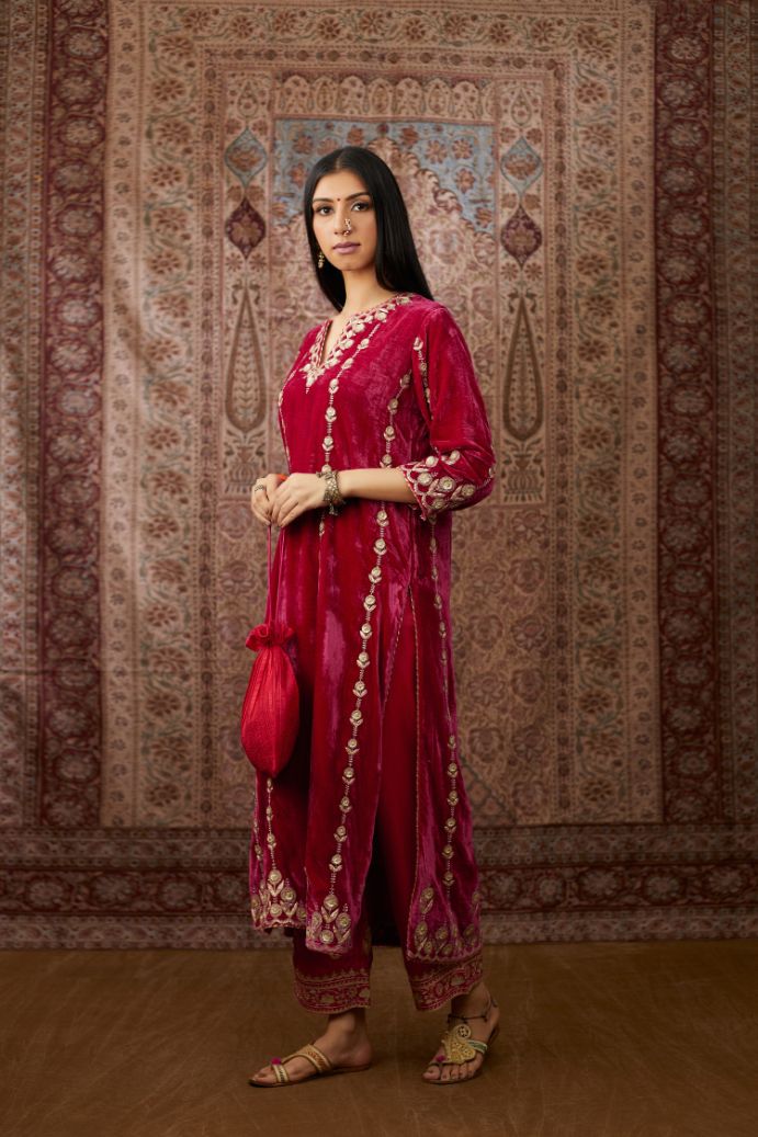 Fuchsia silk velvet straight kurta set with all over gold gota and zari embroidery.