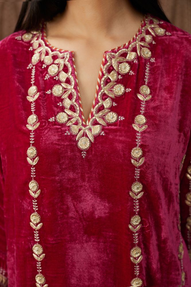 Fuchsia silk velvet straight kurta set with all over gold gota and zari embroidery.