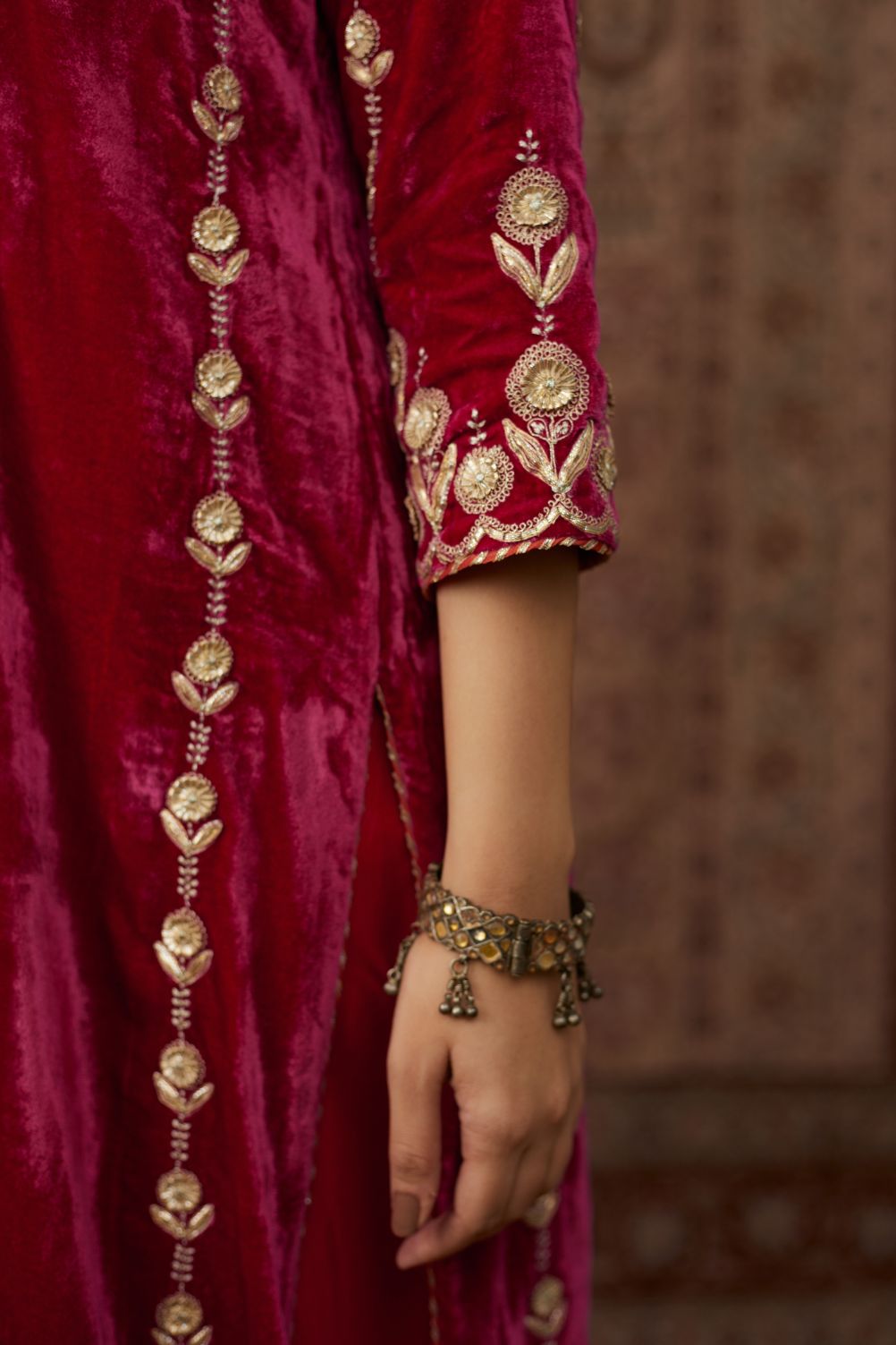 Fuchsia silk velvet straight kurta set with all over gold gota and zari embroidery.