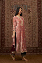 Dusty pink silk velvet kurta set with side panels, highlighted with gold gota and zari embroidery.