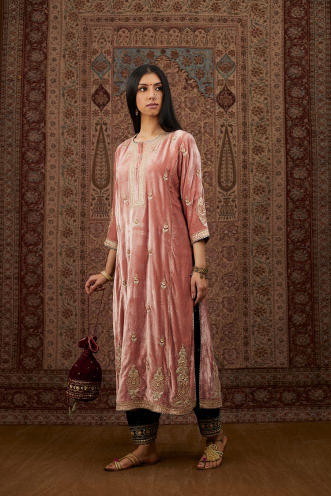 Dusty pink silk velvet kurta set with side panels, highlighted with gold gota and zari embroidery.