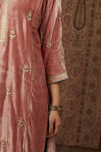 Dusty pink silk velvet kurta set with side panels, highlighted with gold gota and zari embroidery.