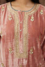 Dusty pink silk velvet kurta set with side panels, highlighted with gold gota and zari embroidery.