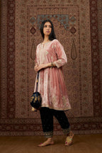 Short kalidar silk velvet kurta set with button placket and all over gold gota and zari embroidery.