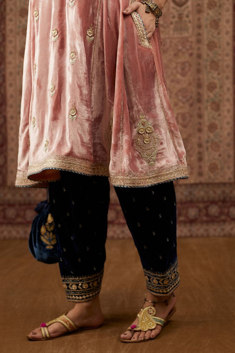 Short kalidar silk velvet kurta set with button placket and all over gold gota and zari embroidery.
