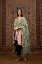 Short kalidar silk velvet kurta set with button placket and all over gold gota and zari embroidery.