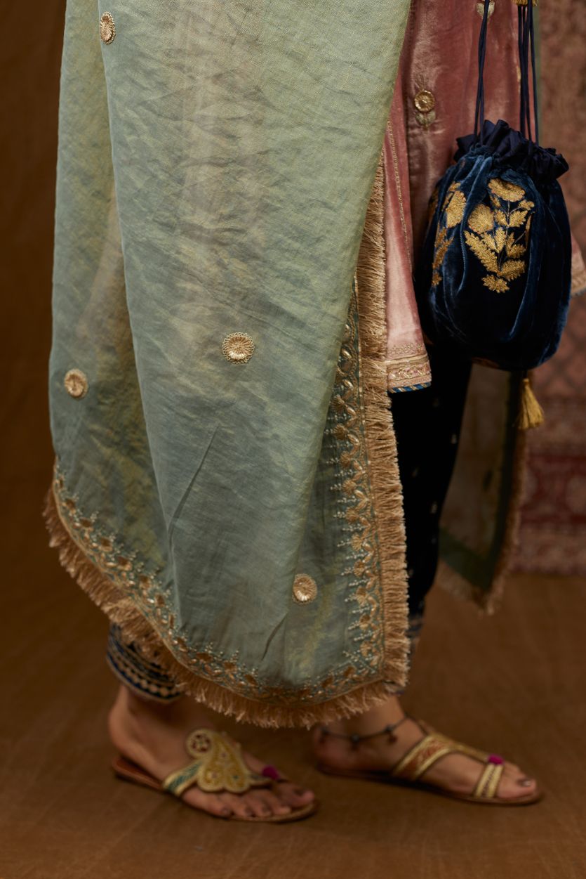 Short kalidar silk velvet kurta set with button placket and all over gold gota and zari embroidery.