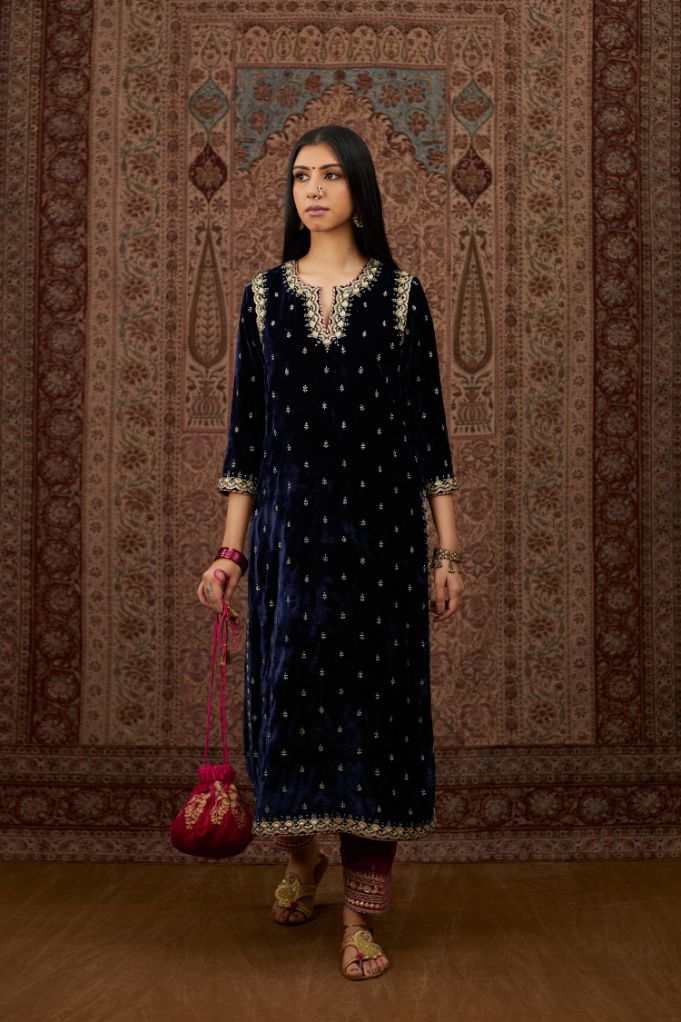Navy blue silk velvet straight kurta set with gold gota and zari embroidery.