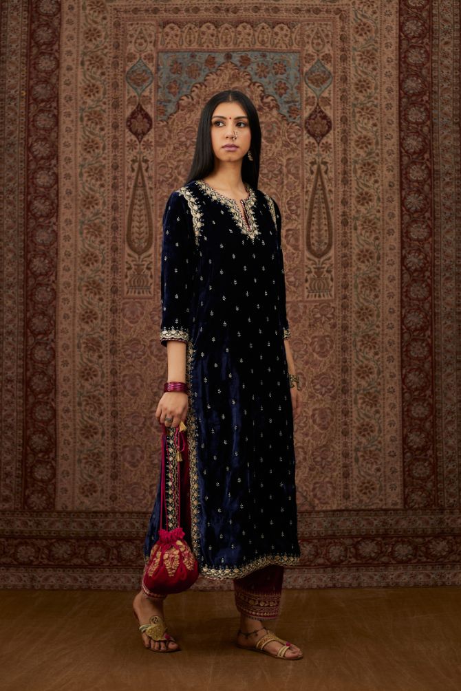 Navy blue silk velvet straight kurta set with gold gota and zari embroidery.