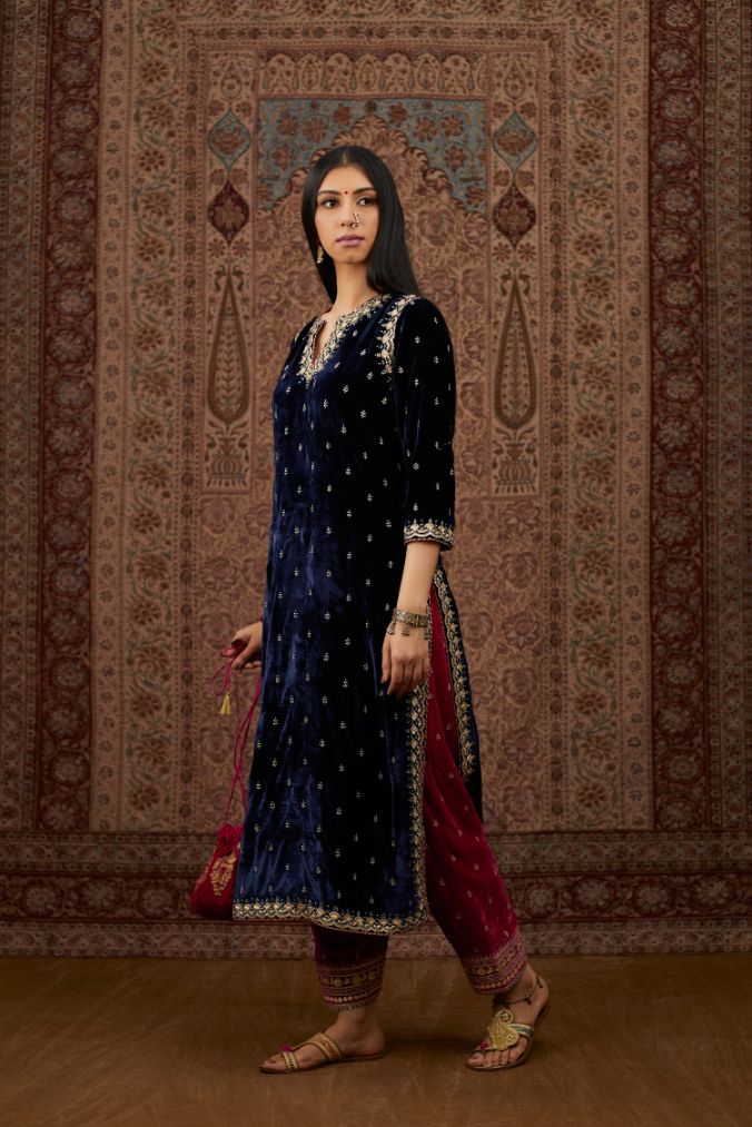 Navy blue silk velvet straight kurta set with gold gota and zari embroidery.