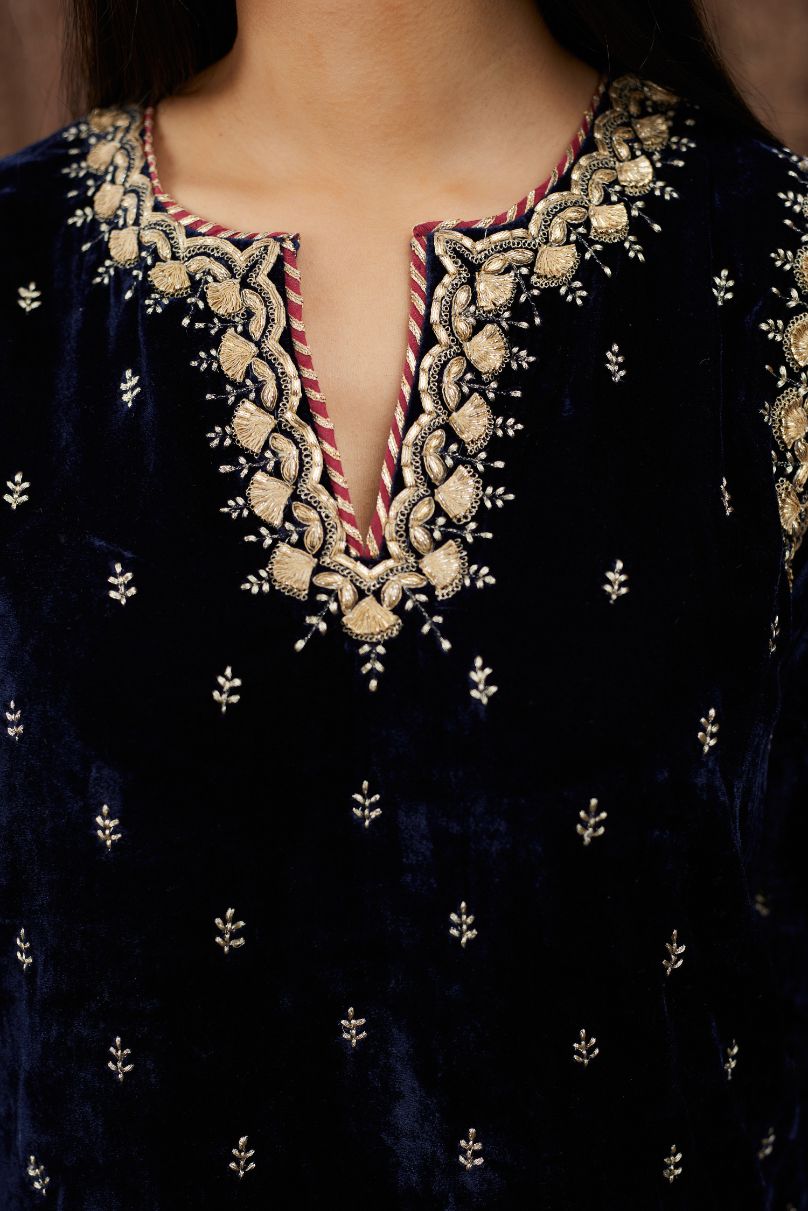Navy blue silk velvet straight kurta set with gold gota and zari embroidery.