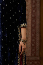 Navy blue silk velvet straight kurta set with gold gota and zari embroidery.