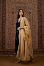Navy blue silk velvet straight kurta set with gold gota and zari embroidery.