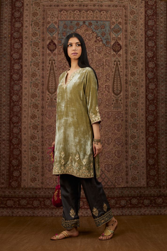 Dusty green silk velvet short kurta set with gold gota and zari embroidery.