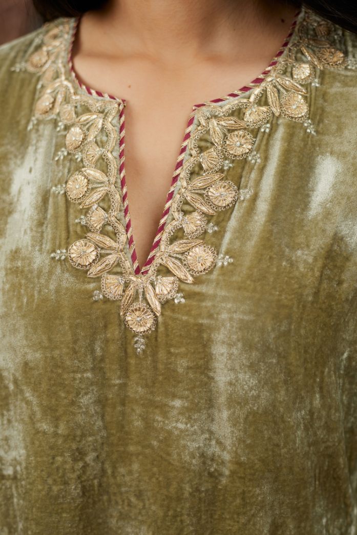 Dusty green silk velvet short kurta set with gold gota and zari embroidery.