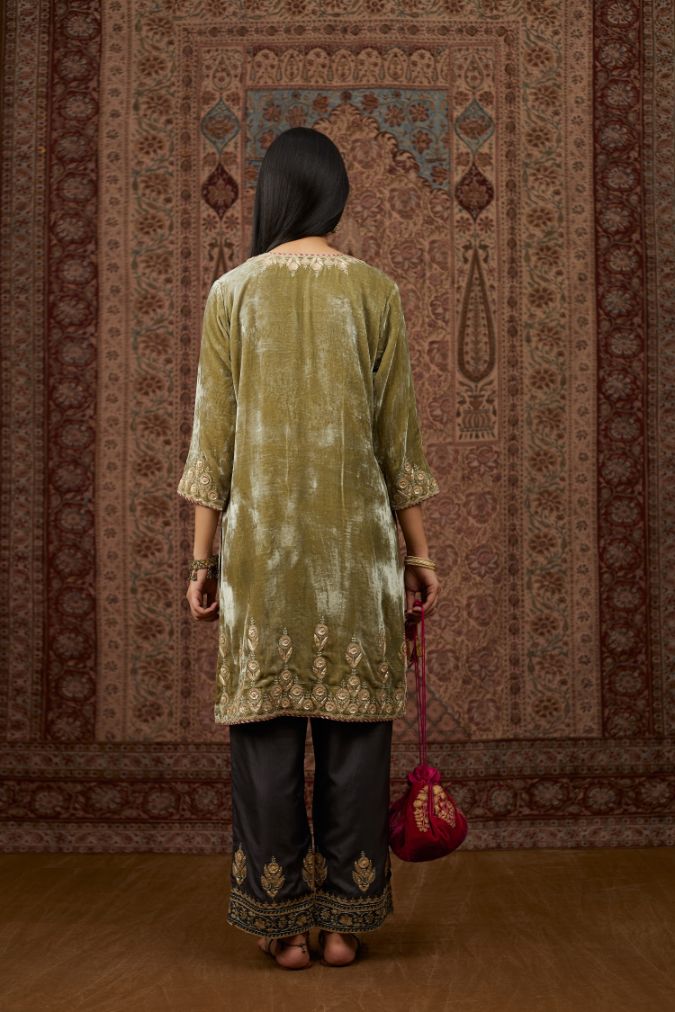 Dusty green silk velvet short kurta set with gold gota and zari embroidery.