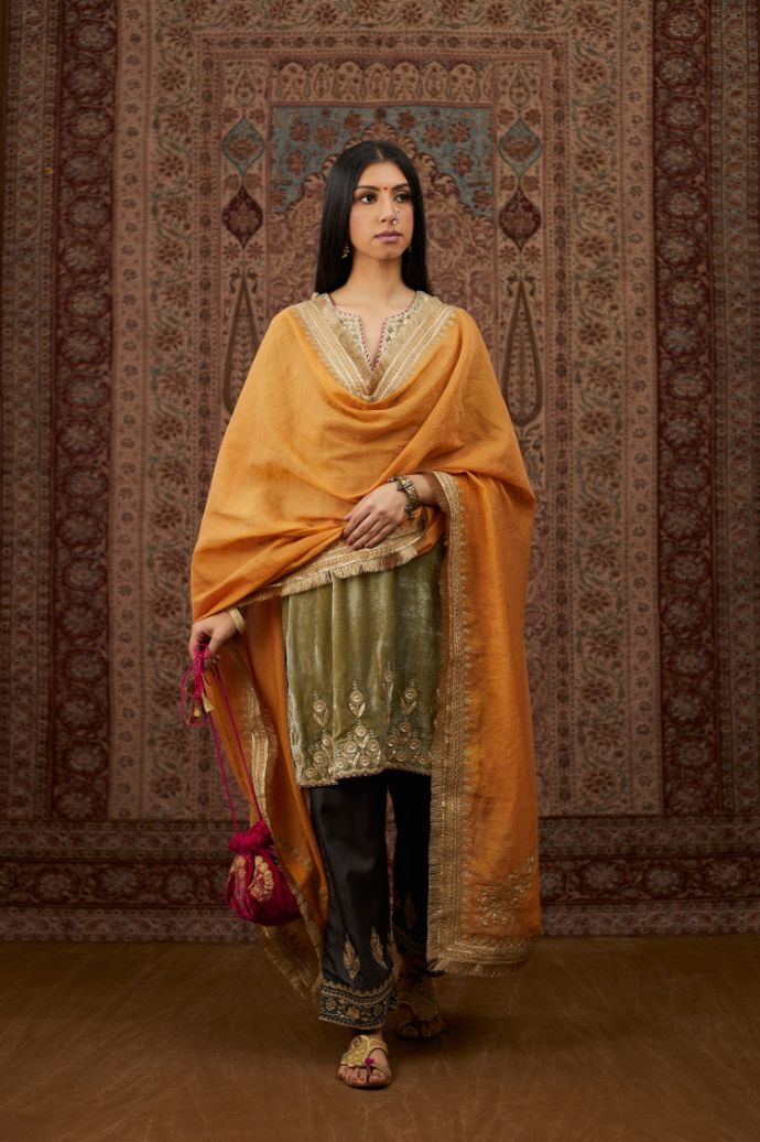 Dusty green silk velvet short kurta set with gold gota and zari embroidery.
