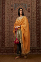 Dusty green silk velvet short kurta set with gold gota and zari embroidery.