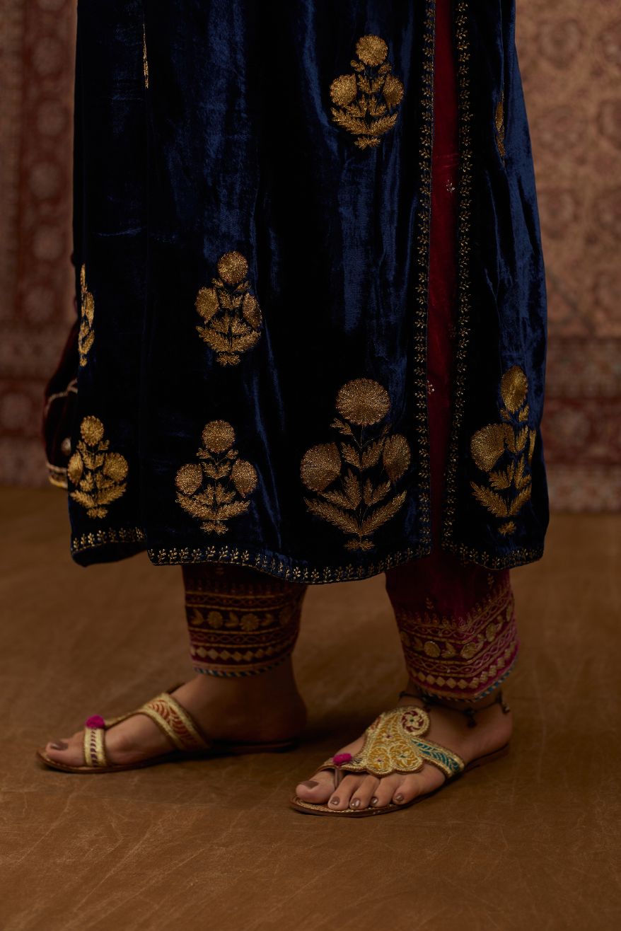 Navy blue silk velvet straight kurta set with all over gold zari embroidery butas.