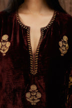 Maroon silk velvet straight kurta set with all over gold zari embroidery butas.