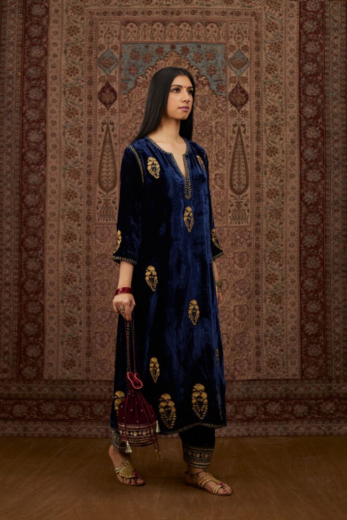Navy blue silk velvet straight kurta set with all over gold zari embroidery butas and round neckline.