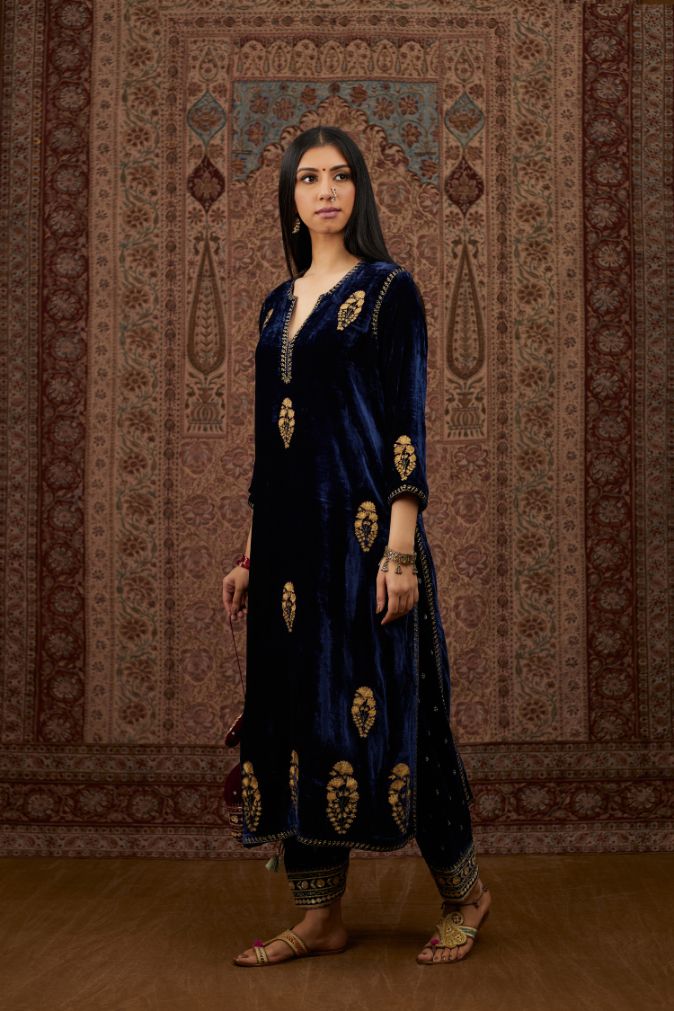 Navy blue silk velvet straight kurta set with all over gold zari embroidery butas and round neckline.