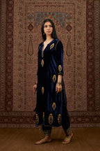 Navy blue silk velvet straight kurta set with all over gold zari embroidery butas and round neckline.