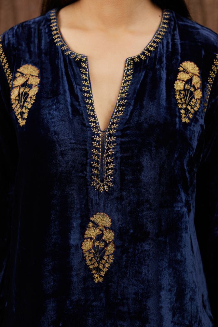 Navy blue silk velvet straight kurta set with all over gold zari embroidery butas and round neckline.