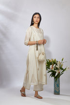 Off white straight kurta set detailed with gota and zari embroidery