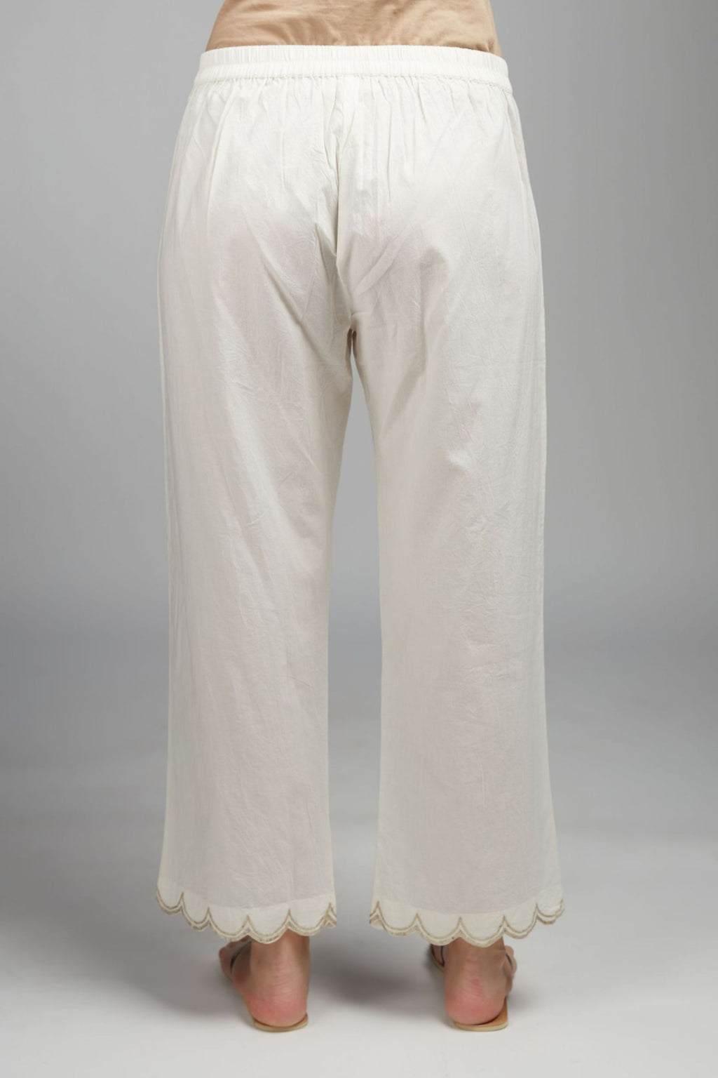 Off white cotton straight pant with gota detailing at hem